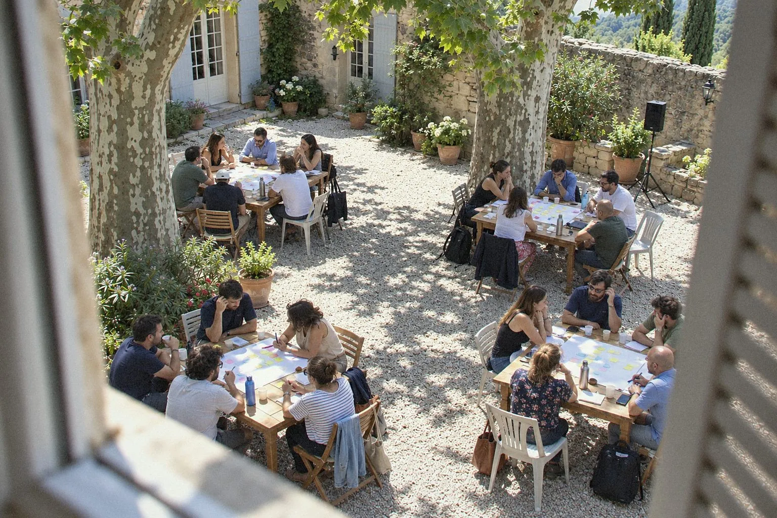 Small-group workshops in the shaded courtyard of a Provençal country house