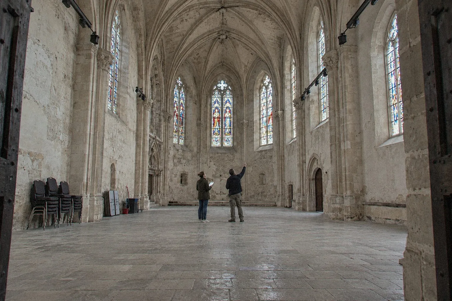 Technical site visit in an empty former chapel before a seminar